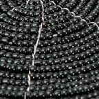 Le dessous de verre perlé - Noir