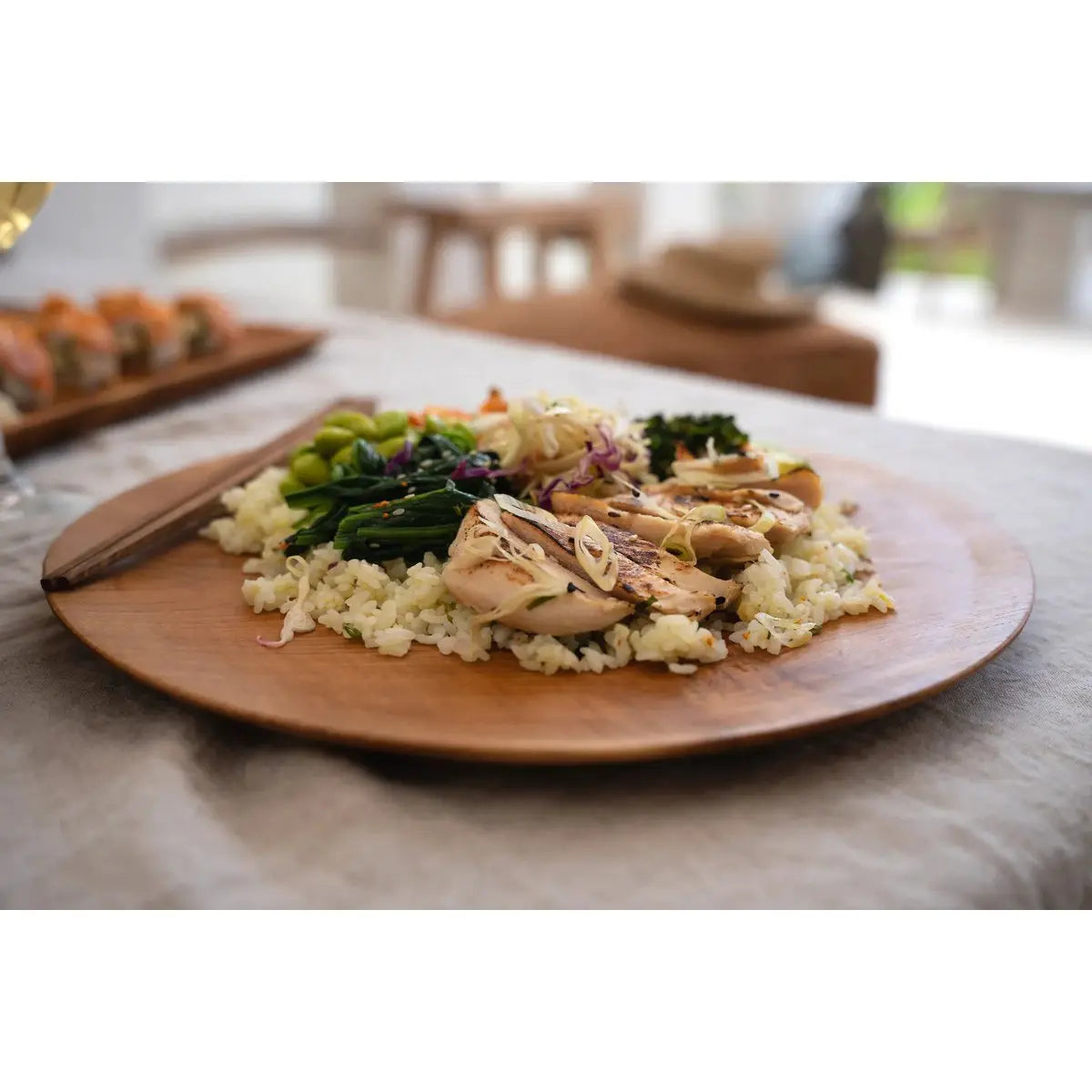 Assiette ronde en racine de teck - M Bazar Bizar Living