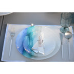 Dessous d'assiette jetable 31.5x45cm blanc et argent rouleau 32 pièce AULICA