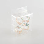 Lot de 4 ronds de serviettes dorés avec diamants verts AULICA