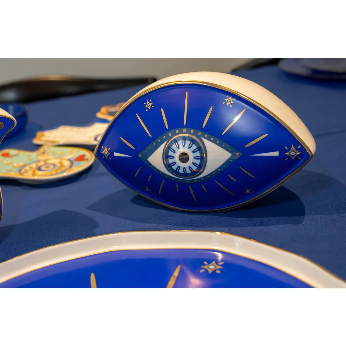 Oeil décoratif bleu foncé 20x12x13.5cm AULICA