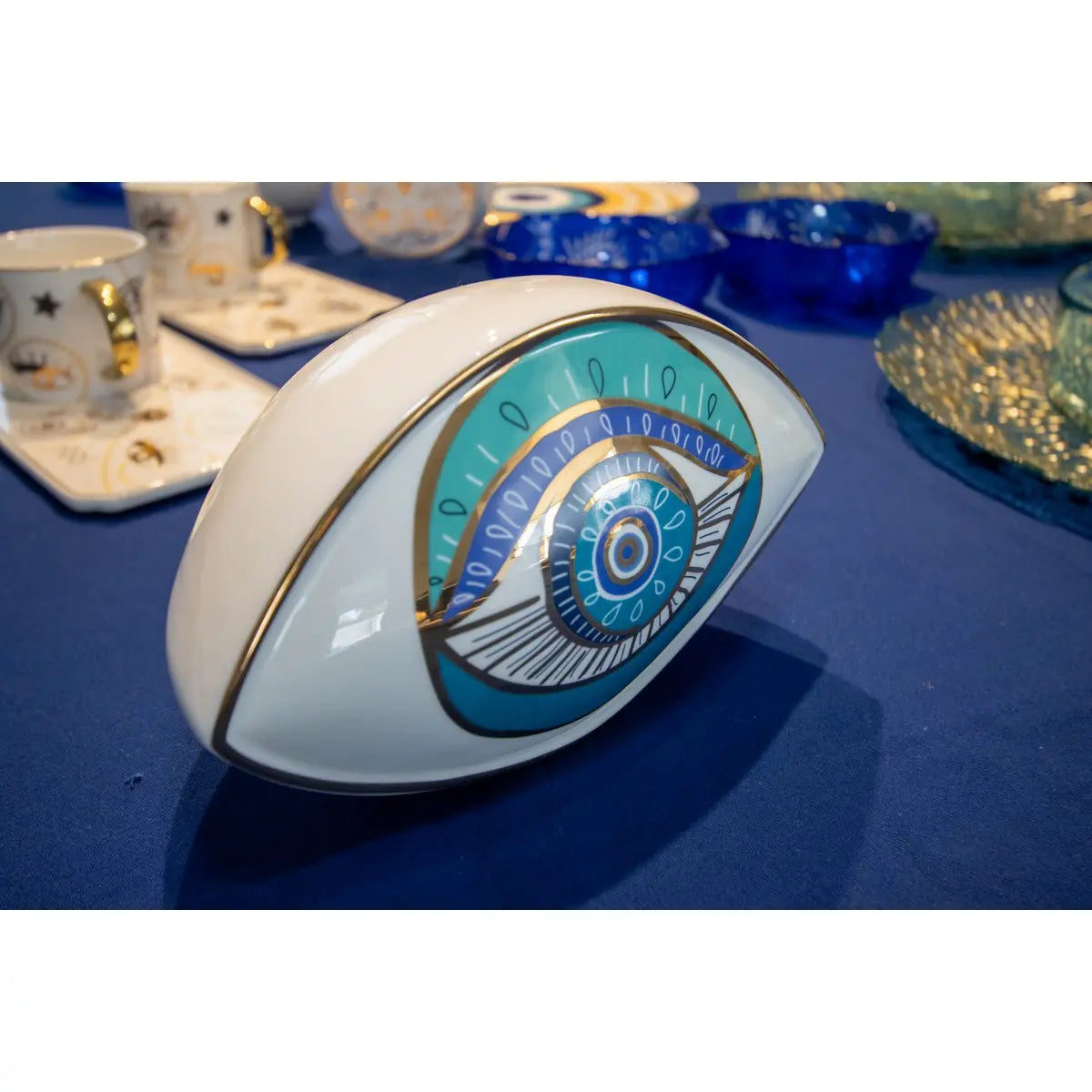 Oeil décoratif turquoise 20x12x13.5cm AULICA