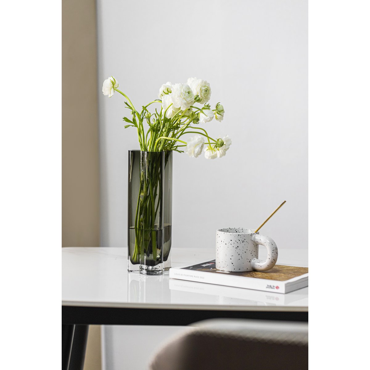 A slim vase with a modern design inspired by CORAL + Aalto, COR26GR